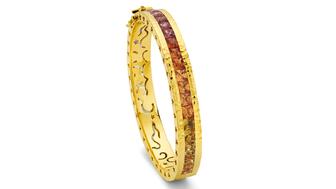 For her celebration of November birthstone jewelry, Amanda Gizzi rounded up 15 jewels featuring citrine and topaz in warm hues, like this Buddha Mama bangle featuring citrine as well as amethyst, tanzanite, rhodolite, tourmaline, and aquamarine (price upon request). Buddha Mama citrine bangle