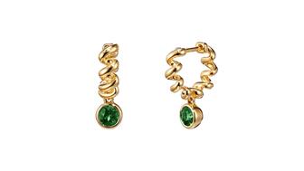 Boochier’s 18-karat yellow gold “Slinkee Drops” earrings with emeralds totaling 0.6 carats ($3,770) Emerald Slinkee Drops earrings