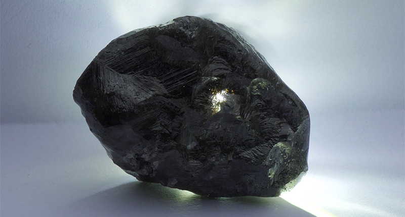 This photo provided by Lucara Diamond Corp. shows a bit of light coming through the back of the 1,758-carat chunk of rough found at Karowe mine over Easter weekend. This photo provided by Lucara Diamond Corp. shows a bit of light coming through the back of the 1,758-carat chunk of rough found at Karowe mine over Easter weekend.