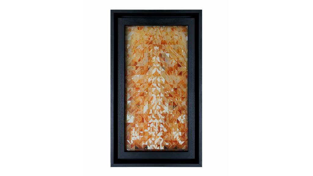 The church windows created by Bernd and his son Tom are approximately 8 feet tall and 3 feet wide, made of agate cut into 1-inch squares and one-half inch triangles. Munsteiner agate church windows
