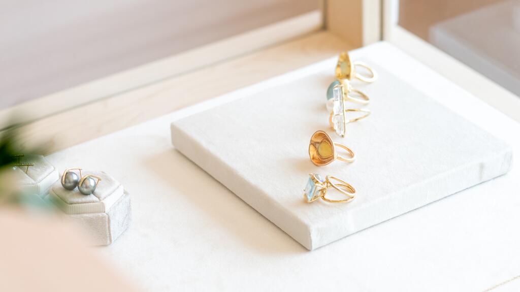 The design goal for the store was to keep the focus on the details of Walker’s jewelry. Photo by Monique Sourinho Katey Walker Laura Putnam Old Saybrook jewelry store