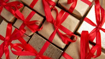 Mastercard predicts retail sales will grow 3.7 percent in November and December, though jewelry sales are forecast to remain essentially flat amid a “rebalancing” in consumer spending. Gold holiday gift boxes