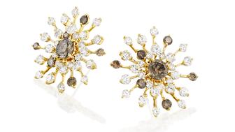 For her New Year’s Style File, Amanda Gizzi selected 15 pieces of jewelry featuring sparkling gold, silver and diamonds, like these firework-esque earrings from Yvel set with white and brown diamonds (price upon request). Yvel earrings