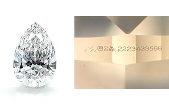 The International Gemological Institute recently graded a 6.01-carat, pear-shaped lab-grown diamond (left) that was inscribed with the GIA report number seen at right, which is for a natural diamond. 6-carat lab-grown diamond its fraudulently inscribed GIA report number