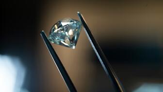 From natural diamond supply to lab-grown diamond prices and future drivers of market growth, Editor-in-Chief Michelle Graff shares four predictions for the diamond market. (©De Beers Group/Photo credit: Ben Perry @ Armoury Films) 2021_De Beers polished in tweezers.jpg