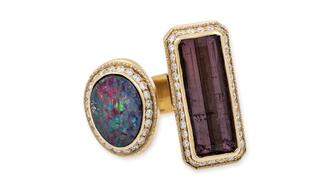 This open ring from Jacquie Aiche features both birthstones for the month of October, opal (in this case, a freeform Australian opal) and tourmaline (a baguette-cut purple tourmaline). It retails for $12,000. Jacquie Aiche opal and tourmaline ring