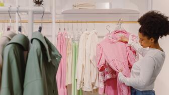 The Conference Board’s consumer confidence index rose in May after three consecutive months of decline. Woman shopping
