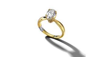 A 14-karat gold engagement ring set with a 2 1/5-carat oval-shaped lab-grown diamond from the Pnina Tornai collection sold at Signet Jewelers-owned banner Jared. Lab-grown diamond jewelry, particularly bridal, experienced growth in July, bucking the overall trend of jewelry sales. 20220822_Pnina Tornai lab-grown bridal.jpg