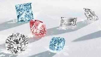 Lightbox, the lab-grown diamond brand De Beers Group launched in 2018 with an $800 per carat pricing structure, is now selling its diamonds for as low as $500 a carat. Pictured is a selection of loose fancy-cut lab-grown Lightbox diamonds. White, pink, and blue lab-grown diamonds from Lightbox