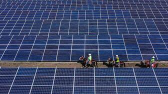 An overhead shot of a solar farm for Greenlab, a lab-grown diamond manufacturer with more than 1,000 reactors spread out among four factories in Surat. Greenlab’s Smit Patel said India’s lab-grown diamond industry has seen “explosive and exponential growth.” 20230315_LGD solar farm drone shot.jpg