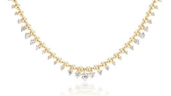 Vice Versa “Kin Necklace” in 14-karat yellow gold with 2.10 carats of white diamonds ($13,625) Vice Versa gold and diamond ball chain tennis necklace