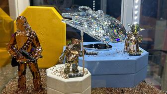 In her annual Comic Con story, Associate Editor Lenore Fedow rounds up her favorite nerdy jewelry. Swarovski set up shop at Comic Con this year, showing off its Disney and Marvel jewels, as well as these Star Wars figures. Swarovski Star Wars figurines