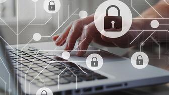 Jewelers Mutual Group has added new cyber education courses to its online Safety and Security Academy. Stock image of hand typing on laptop