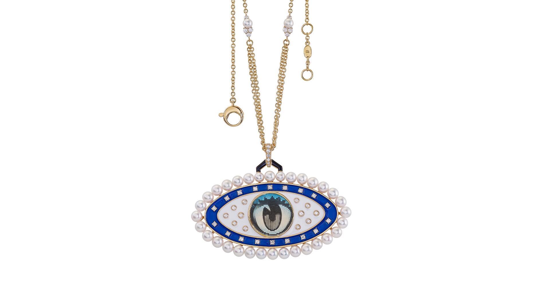Francesca Villa’s “The Blink of an Eye” pearl pendant with a vintage VariVue lenticular image set in 18-karat yellow gold and framed by enamel, pearls, and diamonds totaling 0.98 carats. ($15,550) The Blink of an Eye pendant