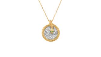 Eriness’ “Snake Coil” necklace in 14-karat yellow gold with two emerald eyes and diamonds totaling 0.93 carats ($4,695) Eriness’ Snake Coil Necklace