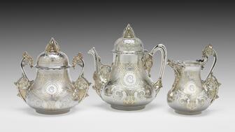 Crafted in 1866-1867, this silver, silver gilt, and ivory tea set is described in Tiffany & Co. records as “Moresque.” It served as an early example of the influence Persian designs had on longtime Tiffany & Co. silversmith Edward C. Moore. A collection of objects belonging to Moore is currently on display at The Metropolitan Museum of Art in New York. (© The Metropolitan Museum of Art, 2024) Tiffany & Co. silver tea set
