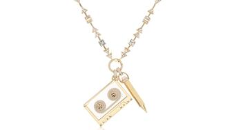 Sorellina’s “Playlist” suite features a “Playlist” necklace with a “Cassette Tape” pendant and a “Cassette Key Pencil” pendant that moves the tape’s golden spool. Cassette Tape Pendant, Pencil Charm, and Playlist Necklace