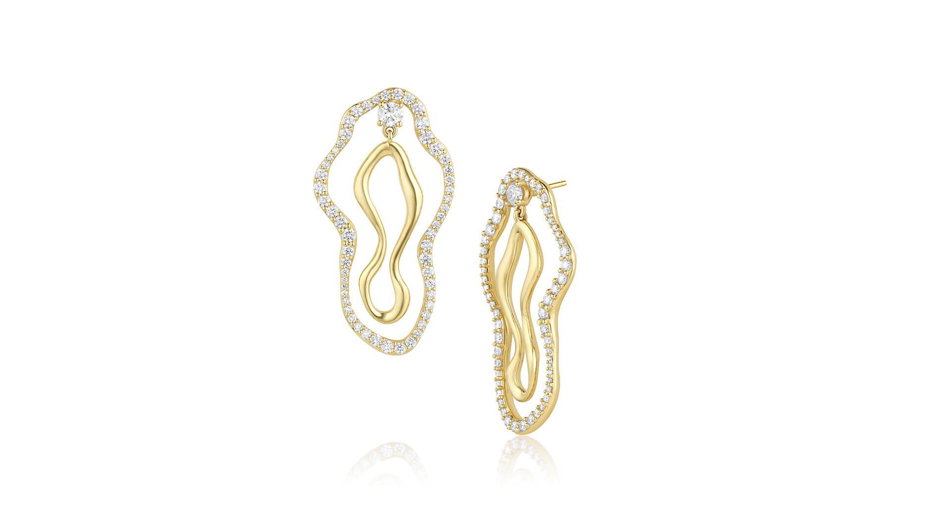 The 14-karat yellow gold “Sculptural Freeform” earrings by Marrow Fine feature a round-cut diamond at the top of each earring and pavé diamonds along the outer shape ($7,950). Sculptural Freeform Earrings
