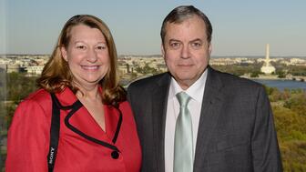 Longtime Washington, D.C., jeweler Brian Mann (right) with his wife Jessie Mann, an artist who custom-paints porcelain Limoges Boxes, at a 2016 Jewelers of America member event. Mann, the longtime co-owner of David Mann Jewelers, died June 21 at age 70. Brian and Jessie Mann