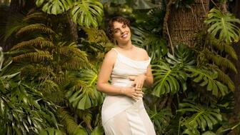 L.A.-based flower designer, Sophia Moreno-Bunge models Guzema’s “Hidden Beauty” collection in front of a garden in Rustic Canyon in Santa Monica, California. Sophia Moreno-Bunge of Isa Isa modeling Guzema’s Hidden Beauty collection