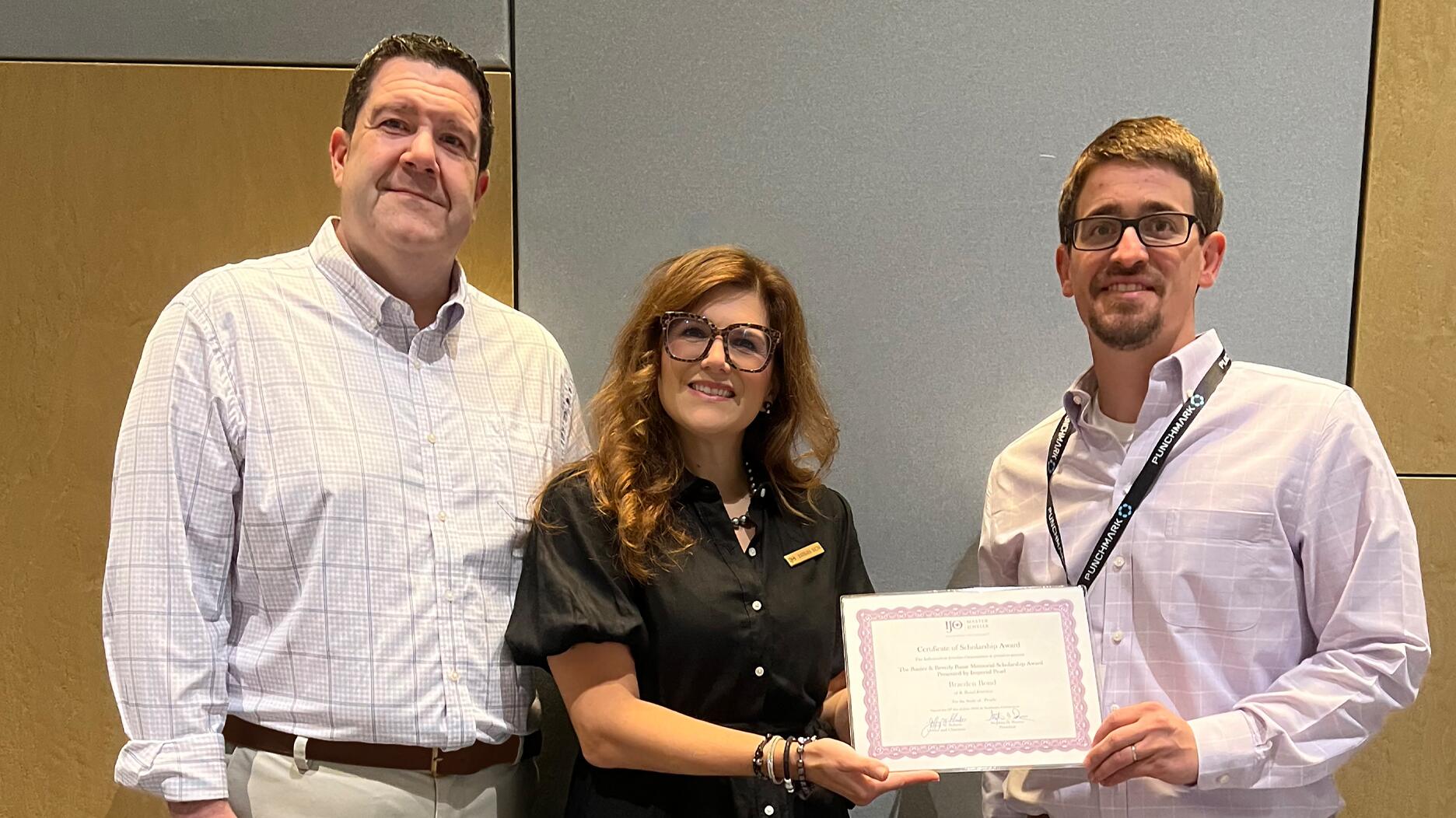 Braeden Bond (right) of K. Bond Jewelers in Wichita Falls, Texas, received the Banice & Beverly Bazar Memorial Pearl Scholarship, sponsored by Imperial Pearl, and is pictured here with Todd and Barbara Bazar. IJO scholarship header