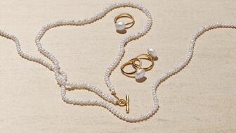 A selection of cultured pearl jewelry from the “Pandora Essence” collection. The company raised its guidance following a strong performance in the first half of the year. Pandora Essence pearl jewelry