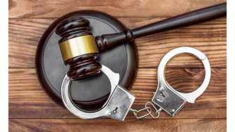 The Wheat Ridge Police Department is recommending the district attorney charge Charles Robinson Shay in the Nov. 29 murder of Peter Damian Arguello, owner of Peter Damian Fine Jewelry & Antiques. Stock image of handcuffs and gavel